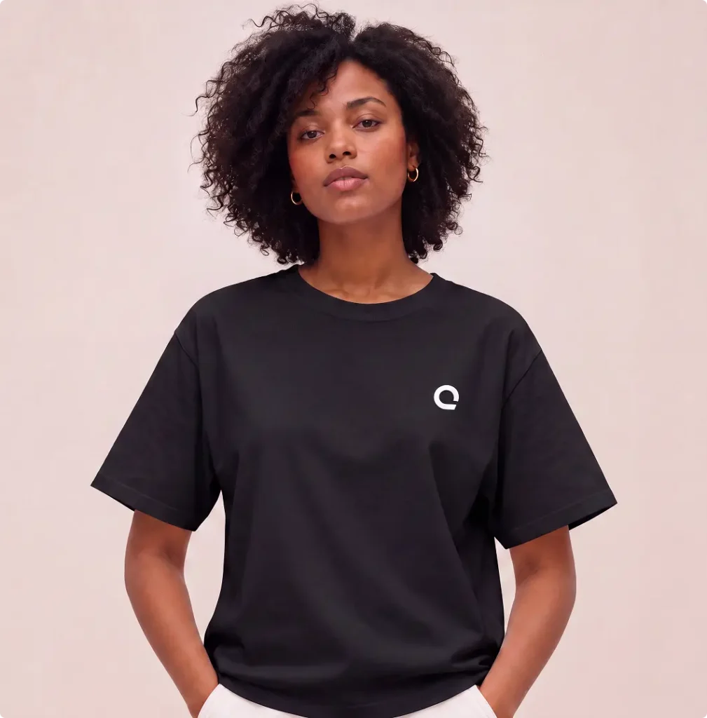 Model wearing black Zoreilles T-shirt with white isotope logo