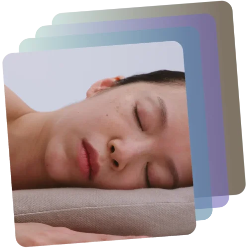 Woman resting with her head on layered cushions
